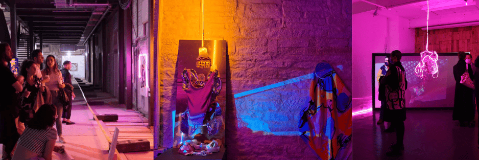 Exhibition installation with neon lights and audience, mixed media